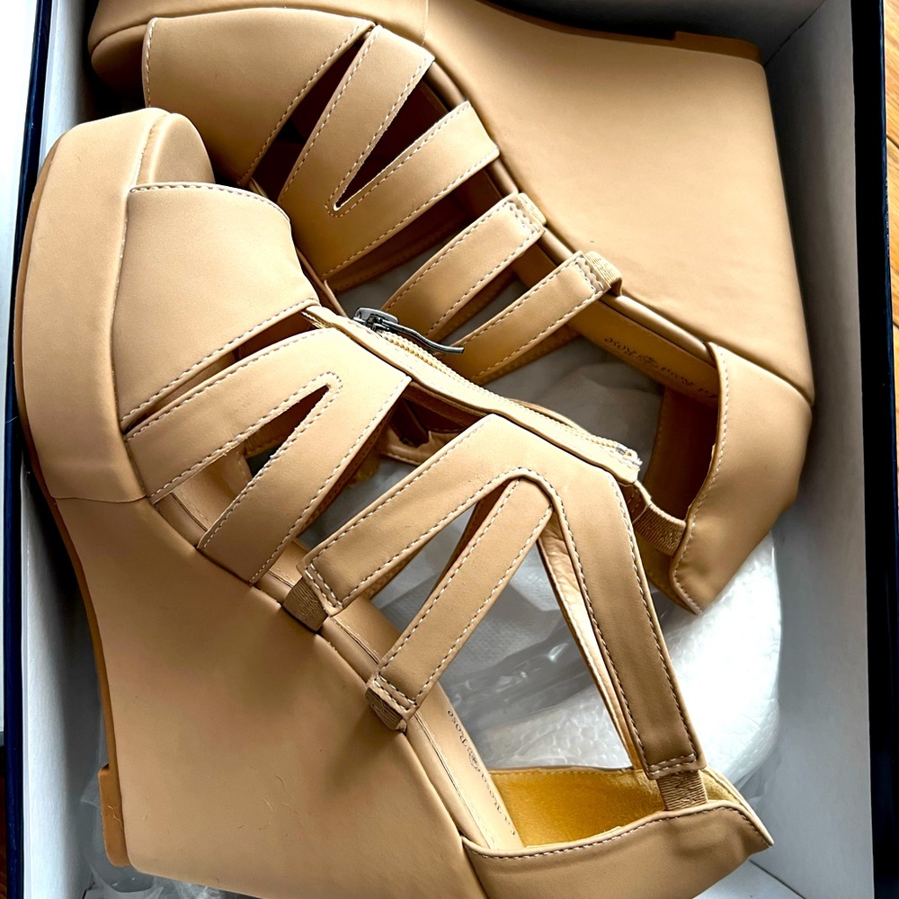 tan wedges  never worn out anywhere.